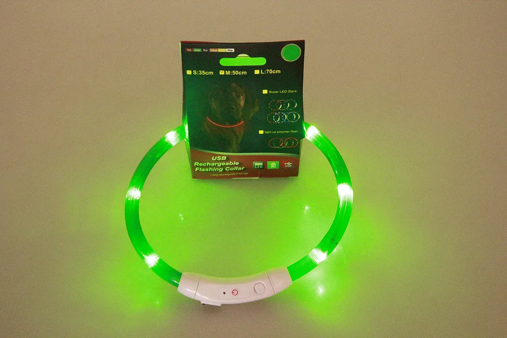 Green LED dog collar in its packaging