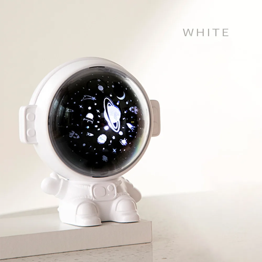 White astronaut galaxy projector, studio shot