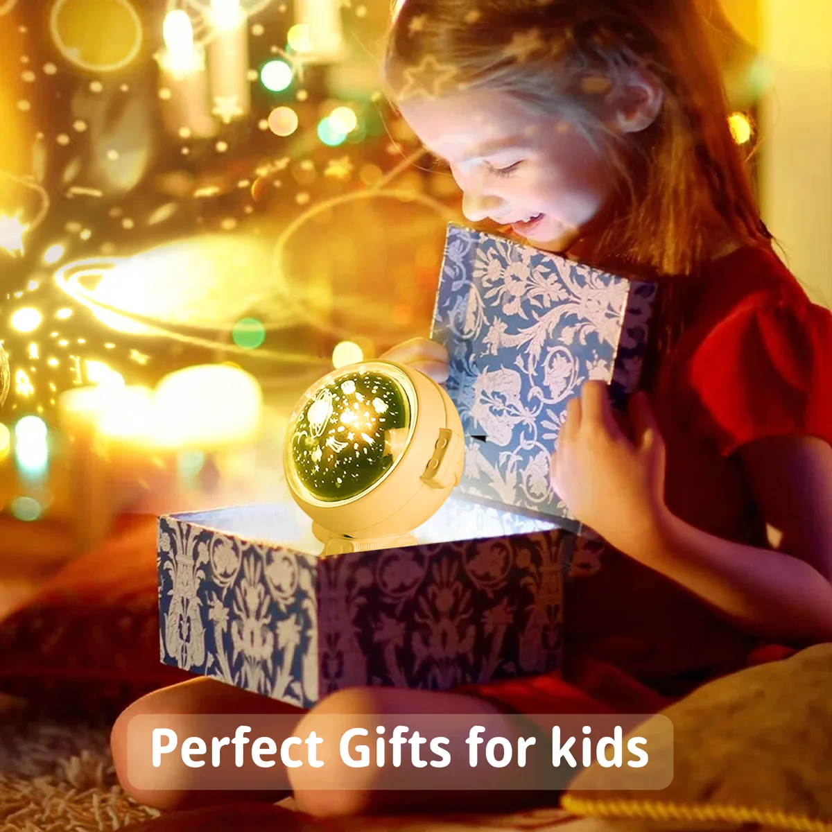 Girl unwrapping the astronaut galaxy projector as a Christmas gift